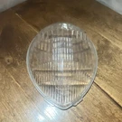 Original 1938-39 Ford Twolite No. 81A-13060 Teardrop Headlamp Headlight Lens. Fixed Price $35.00.
